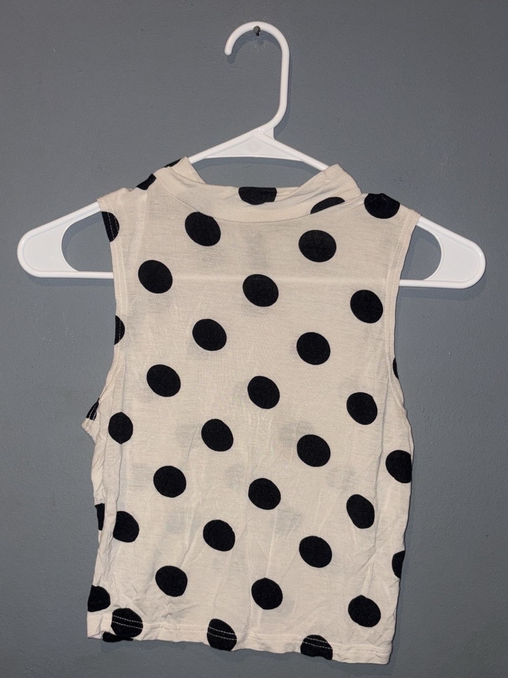 Black and light beige polka dot top
